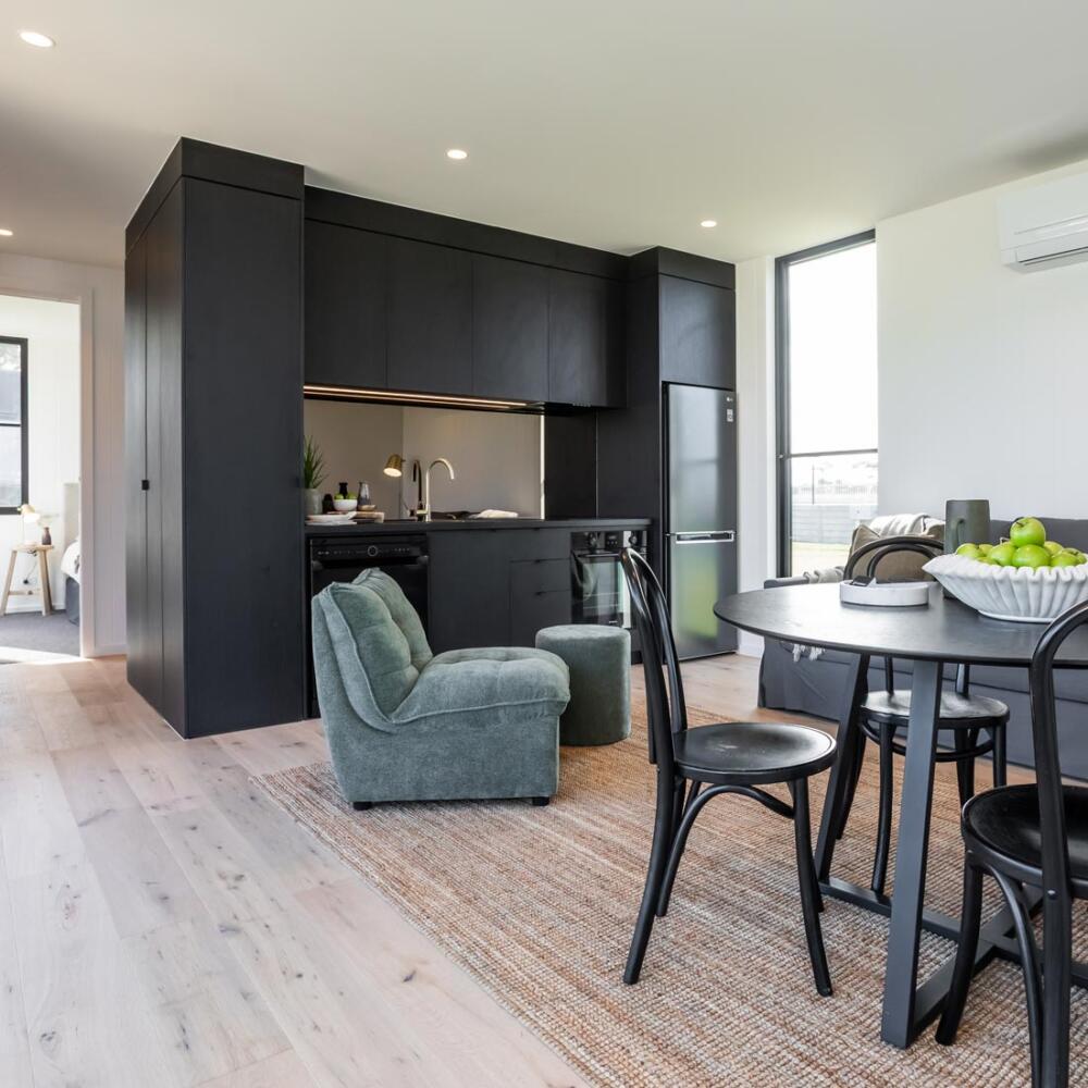 Kitchen and dining area of prefab studio home built by The Quarters Co in Victoria