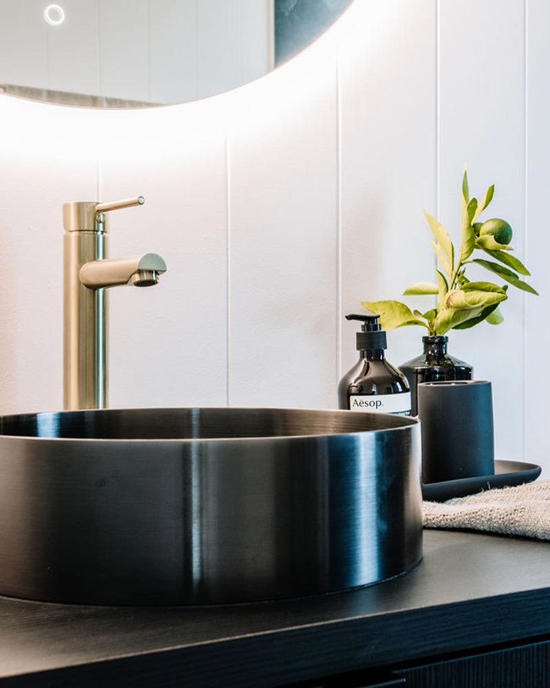 Quality bathroom fittings inside modular home built by The Quarters Co in Victoria